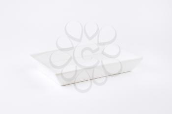white rectangular dish on white background