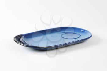 Combined blue oval saucer and plate