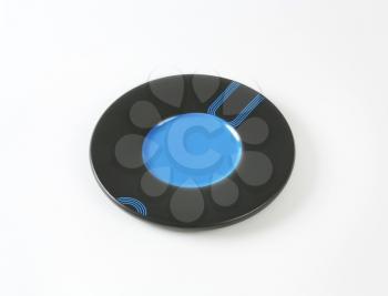 Modern style black and blue saucer