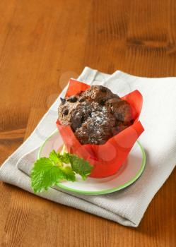 Double chocolate cupcake
 wrapped in red paper