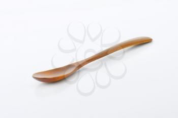 Small rustic natural wood spoon