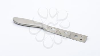 cheese knife with holes in the blade, designed for slicing soft cheese