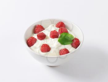 bowl of yoghurt with raspberries