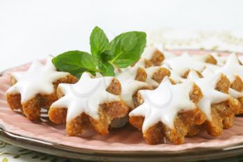 Cinnamon star cookies glazed with frosting