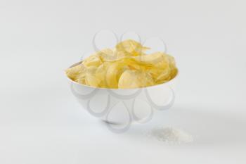 Bowl of thin potato crisps