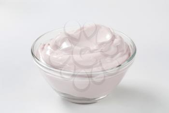 white cream in a small glass bowl