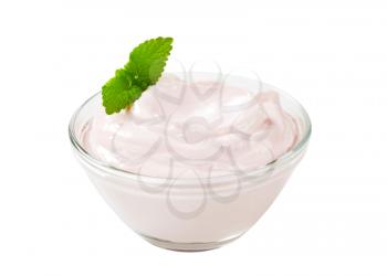 bowl of light pink yogurt isolated on white