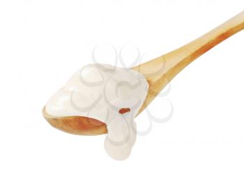 Sour cream on a wooden spoon isolated on white