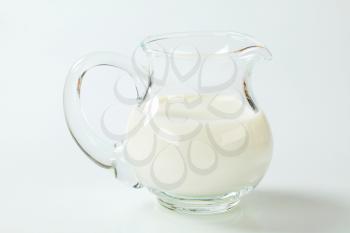 fresh milk in a glass jug
