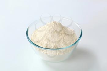 white wheat flour in a small glass bowl