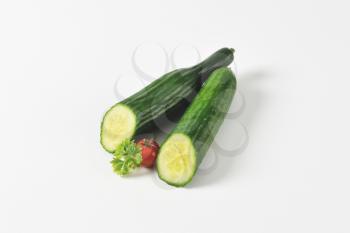 Two halves of fresh slicing cucumber