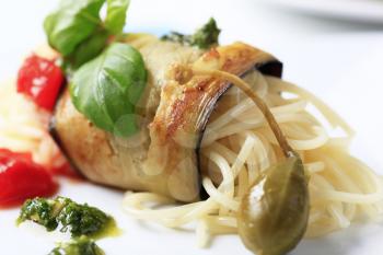 Vegetarian appetizer - Spaghetti wrapped in a slice of grilled aubergine
