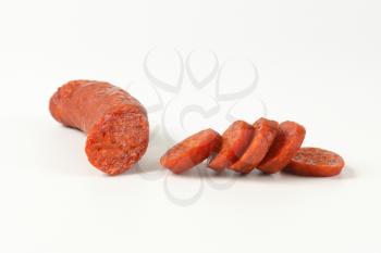 Sliced spicy smoked Hungarian sausage (Csabai kolbasz)