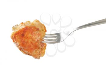 roasted chicken thigh on fork