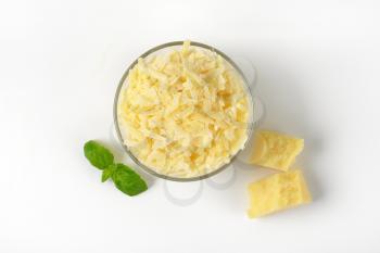 bowl of grated parmesan cheese
