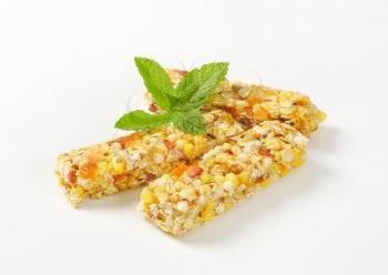 Cereal bars with pieces of dried apricot and apple