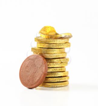 tack of gold foil covered chocolate coins