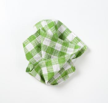 green and white checkered dish towel