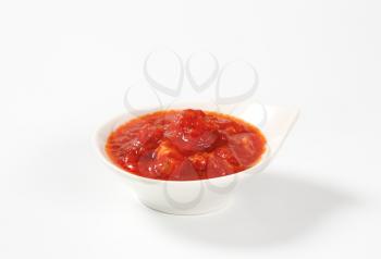 bowl of tomato-based dipping sauce or pasta sauce