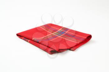 red and blue place mat on white background
