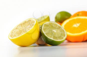 close up of fresh citrus fruit on white background