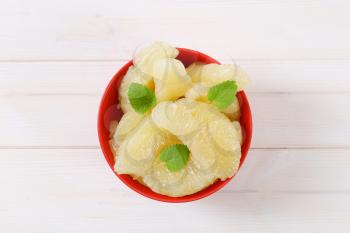 bowl of peeled pomelo segments