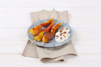 balsamic glazed fruit skewers (pear and orange) and yogurt sprinkled with chopped hazelnuts