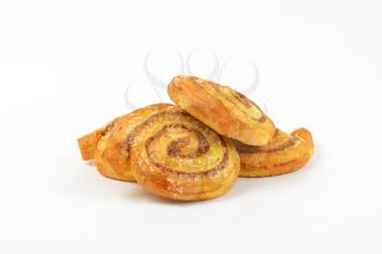 sweet cinnamon rolls on white background