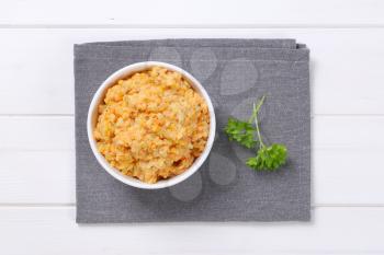 Bowl of cooked red lentils