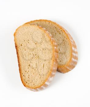 Slices of continental yeast bread on a white background