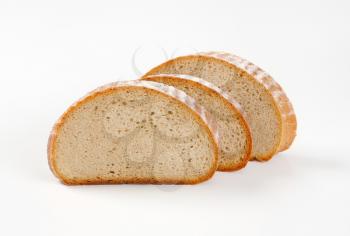 Slices of continental yeast bread on a white background