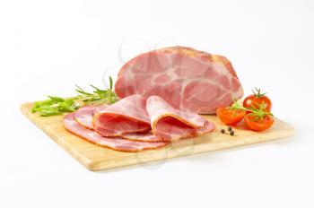 Smoked pork neck on cutting board