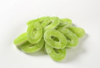 Ring-shaped apple gummies coated in sugar