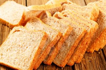 Sliced loaf of whole wheat sandwich bread