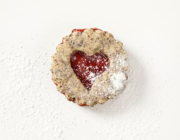 shortbread cookie with jam filling on white background