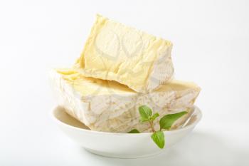 Wedges of French white rind cheese