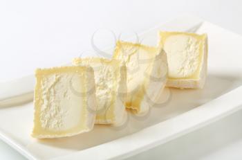 Halved Crottins de Chevre - French goat milk cheese