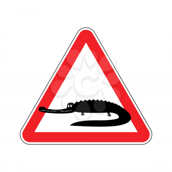 Attention crocodile. Alligator on red triangle. Road sign Caution predator reptile
