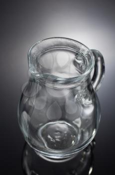 glass pitcher  on black background