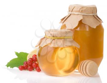 jar of honey and fruit isolated on white background