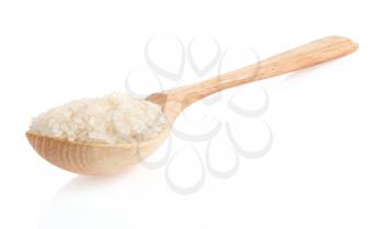 rice grain in wooden spoon isolated on white background