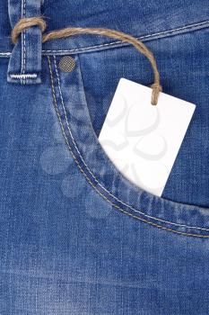 price tag over blue jeans textured pocket