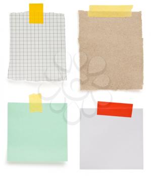 ragged note paper and stripe of adhesive tape isolated on white background