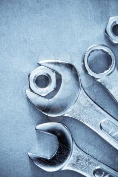 wrench tools at metal background