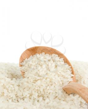 rice grain in wooden spoon isolated on white background