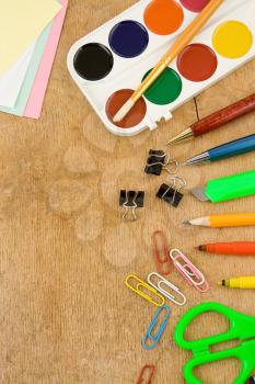 school accessories on wooden table