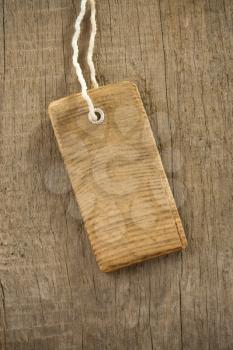 price tag over wood background texture
