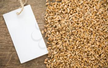 wheat grain and tag price on wood