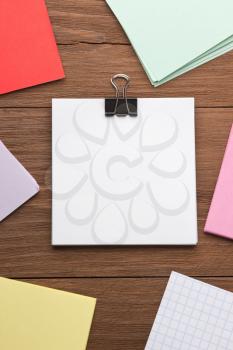 note paper on wood background