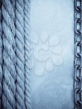 chain and ship rope on metal texture background